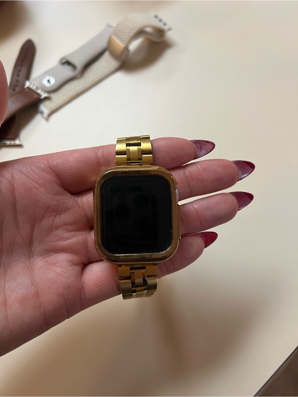Apple silver stainless steel smartwatch with link band and case